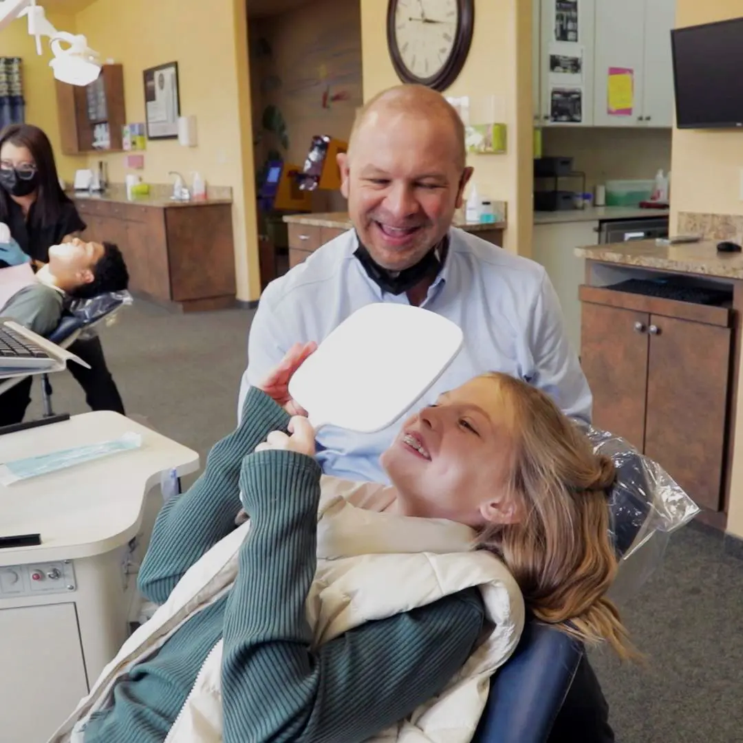 Dr. Gerken with a smiling patient